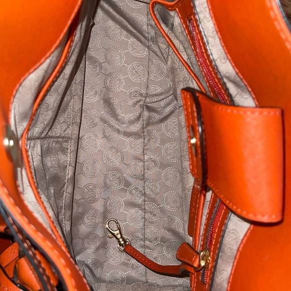 Michael Kors Orange Satchel with Gold Accents. Large and...